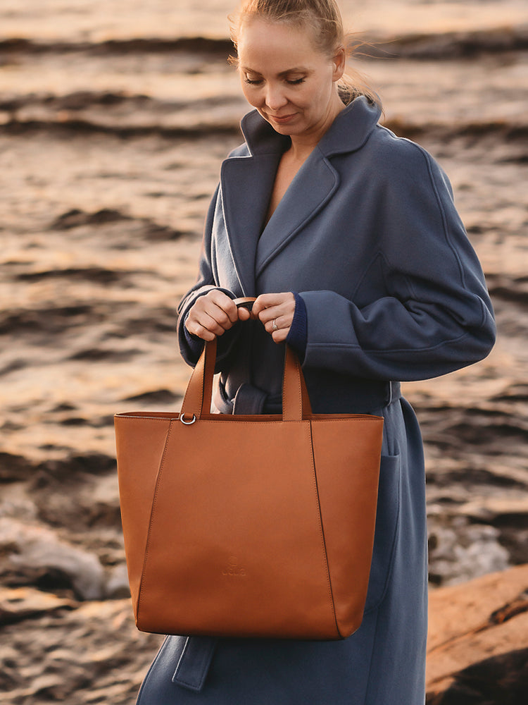 Utuan nappa nahkainen käsilaukku on loistava työlaukku