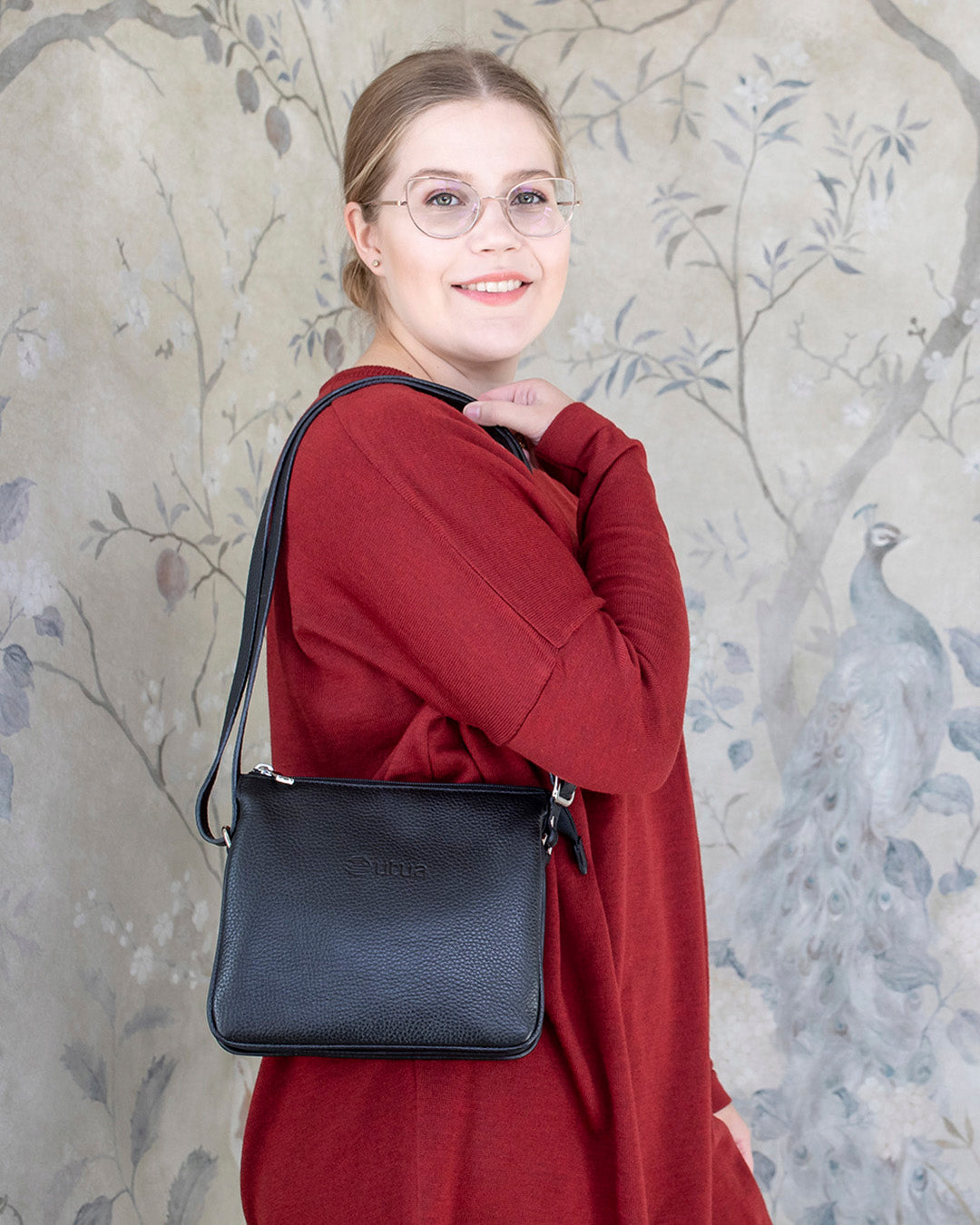 utua musta kulo olkalaukku nahkainen