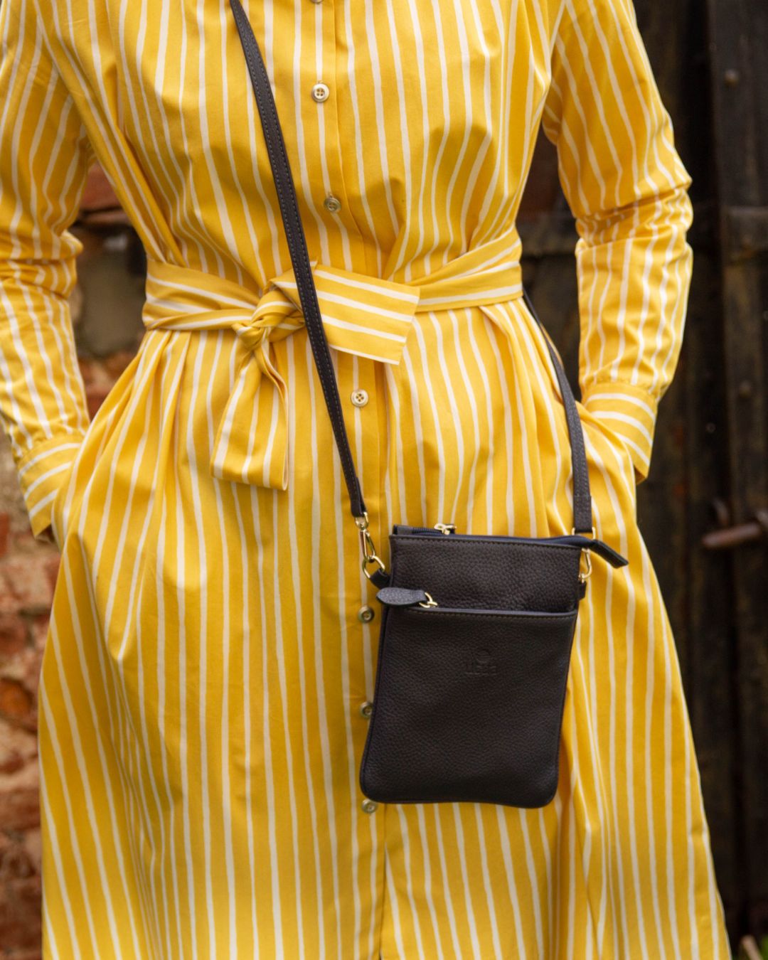 utua santra puhelinpussukka pikkulaukku oranssi