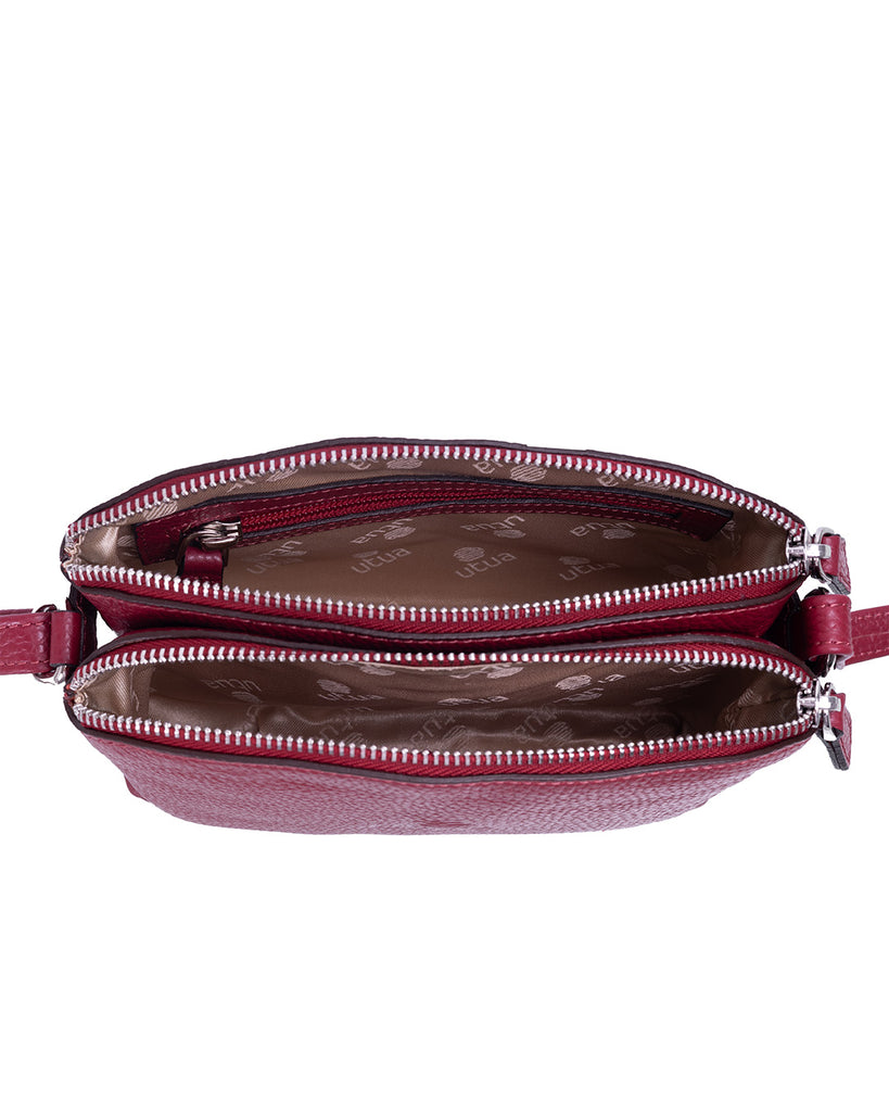 Kotimaisen_Utua_brandin_puolukan_punainen_pikkulaukku_Utua_Lysti