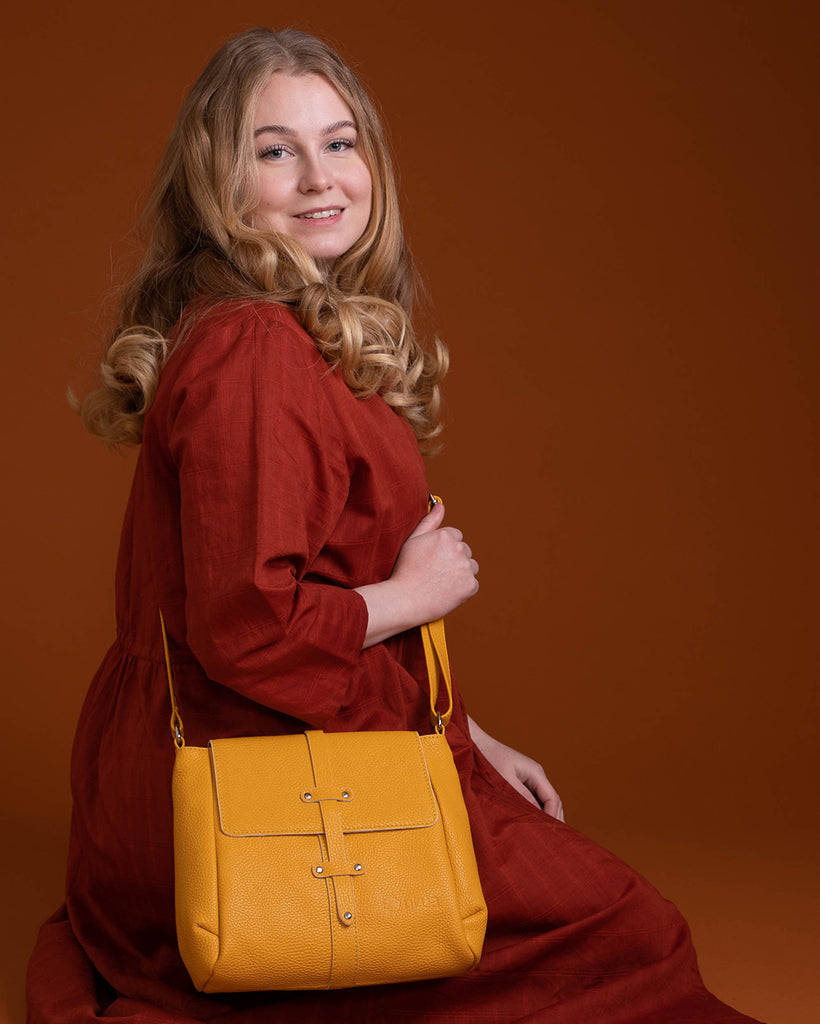 Utua Tasku olkalaukku musta fiilis